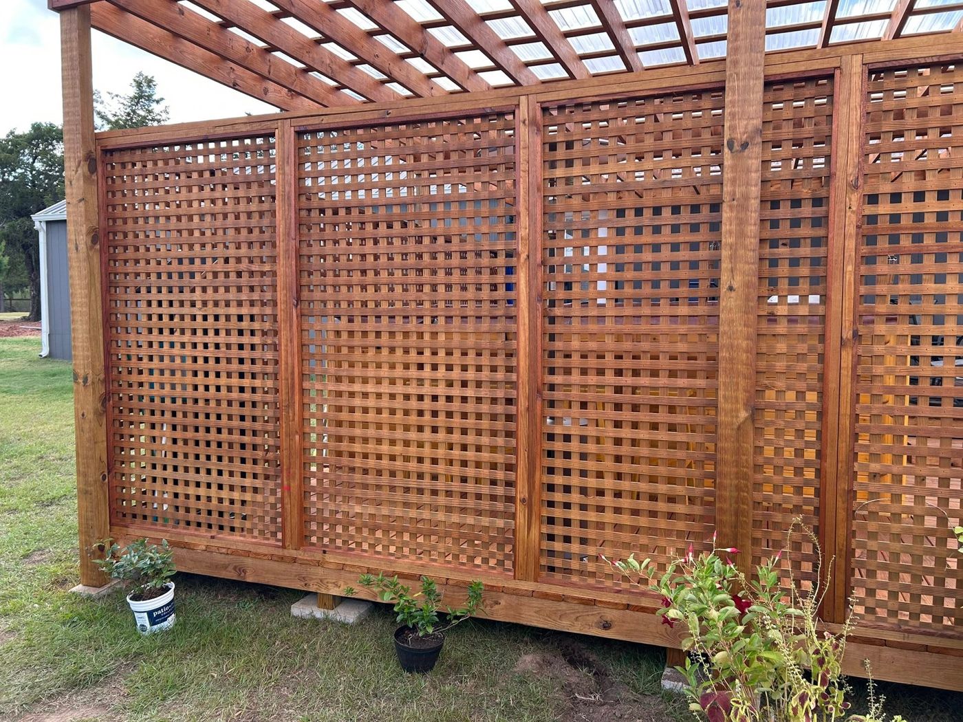 Lattice Privacy Walls: Stained lattice panels for privacy without losing the breeze.