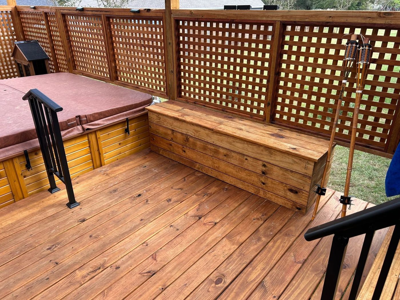 Built-in Storage Bench: Bench seating with storage, right beside the hot tub.